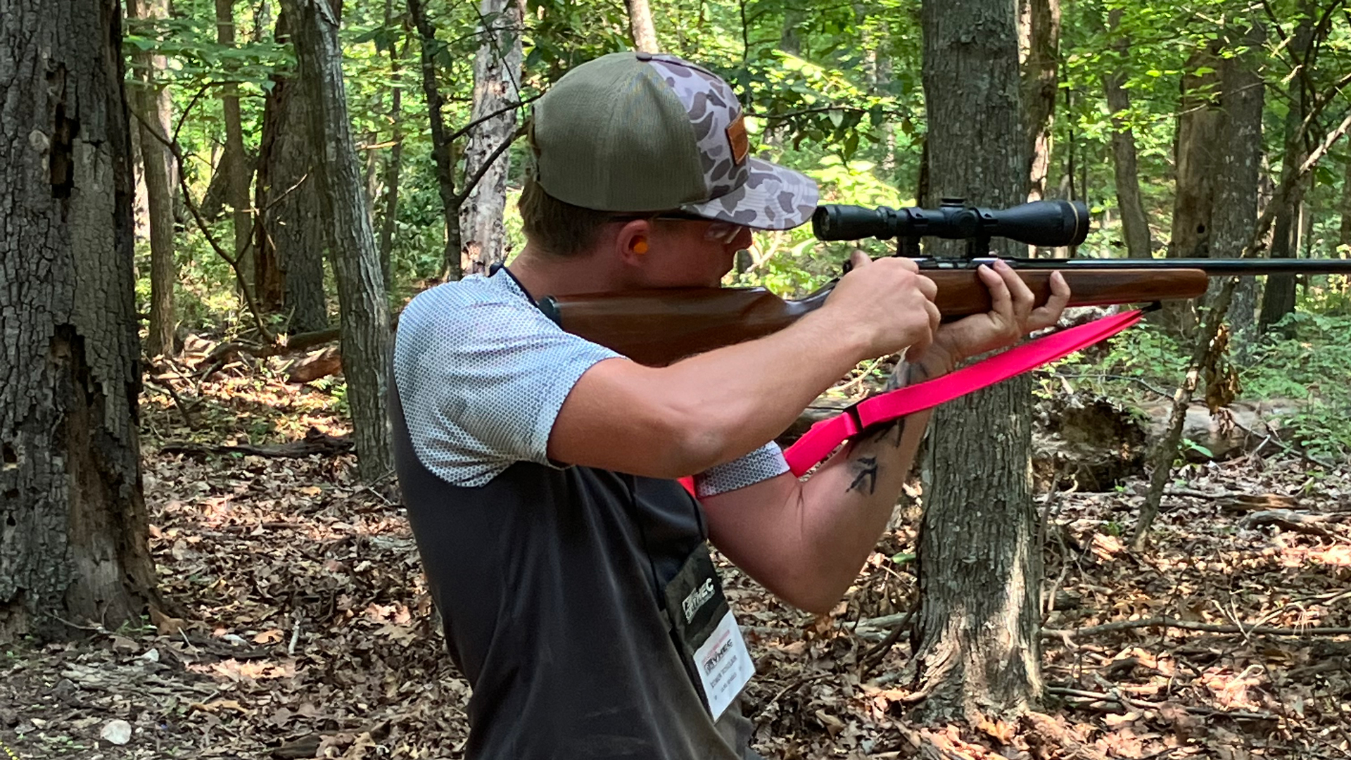 boy competes in .22 rifle in nra youth hunter education challenge